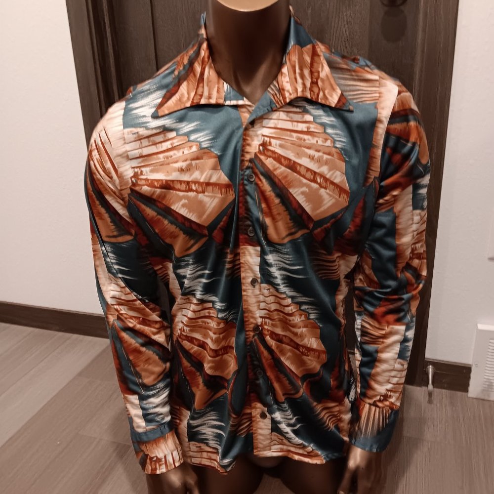 Vintage Oleg Cassini 100% polyester disco shirt by Burma Bibas. Size large.